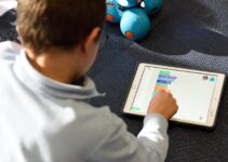 man using silver iPad