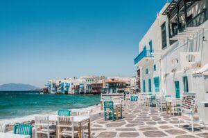 white and brown concrete buildings near sea during daytime