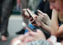 person holding black phone