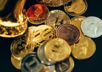 a pile of different types of coins