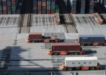 white and red truck on road during daytime