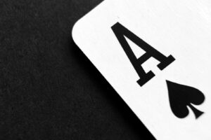 Ace of Spade Playing Card on Grey Surface