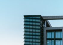a very tall building with a sky in the background