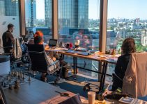 person sitting beside table
