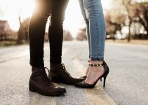 worm's eye view photography of man and woman facing each other