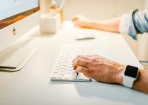 person using iMac