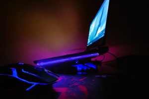 a computer desk with a mouse and a monitor