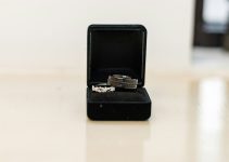 a couple of rings sitting inside of a ring box