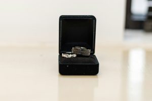 a couple of rings sitting inside of a ring box