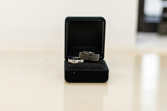 a couple of rings sitting inside of a ring box